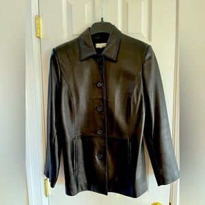 Petite genuine leather car coat. Buttery soft with buttons. No scratches/scuffs.